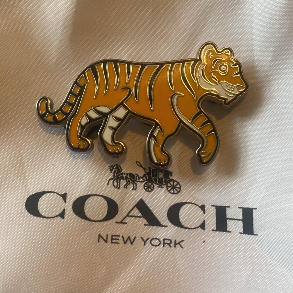 Coach tiger pin- three screws in the back